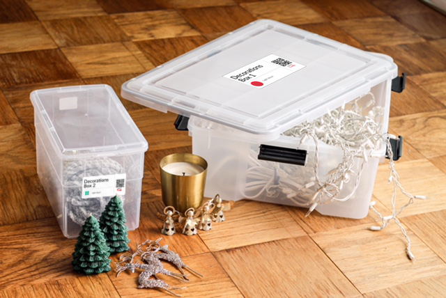 Transparent Storage containers with QL labels for managing holiday decorations