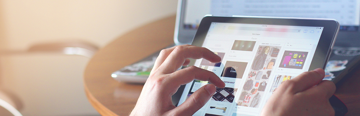 A woman uses an iPad.