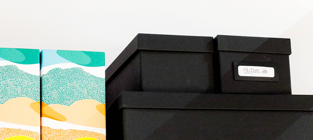 Multicolor and black organizational boxes
